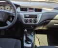 Серый Мицубиси Лансер, объемом двигателя 1.58 л и пробегом 162 тыс. км за 4100 $, фото 12 на Automoto.ua