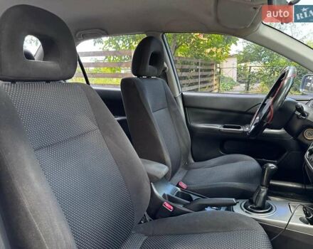 Серый Мицубиси Лансер, объемом двигателя 1.6 л и пробегом 196 тыс. км за 4490 $, фото 24 на Automoto.ua