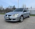 Сірий Міцубісі Lancer, об'ємом двигуна 1.6 л та пробігом 276 тис. км за 4000 $, фото 1 на Automoto.ua