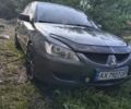 Серый Мицубиси Лансер, объемом двигателя 1.6 л и пробегом 310 тыс. км за 3689 $, фото 1 на Automoto.ua