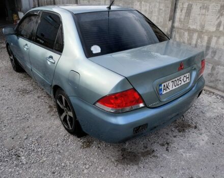 Мицубиси Лансер 2005 в Днепре (Днепропетровске) на Automoto.ua Серый Мицубиси Лансер, объемом двигателя 1.6 л и пробегом 200 тыс. км за 1400 $, фото 3 на Automoto.ua