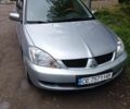 Сірий Міцубісі Lancer, об'ємом двигуна 1.58 л та пробігом 110 тис. км за 4000 $, фото 1 на Automoto.ua