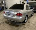 Сірий Міцубісі Lancer, об'ємом двигуна 1.3 л та пробігом 304 тис. км за 3950 $, фото 5 на Automoto.ua