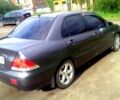 Сірий Міцубісі Lancer, об'ємом двигуна 1.6 л та пробігом 196 тис. км за 5200 $, фото 2 на Automoto.ua