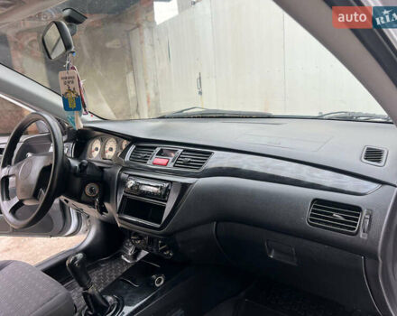 Сірий Міцубісі Lancer, об'ємом двигуна 1.6 л та пробігом 310 тис. км за 3350 $, фото 27 на Automoto.ua