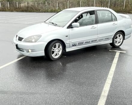 Сірий Міцубісі Lancer, об'ємом двигуна 2 л та пробігом 1 тис. км за 3500 $, фото 3 на Automoto.ua