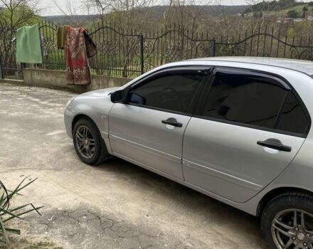 Сірий Міцубісі Lancer, об'ємом двигуна 0.16 л та пробігом 295 тис. км за 4000 $, фото 14 на Automoto.ua