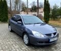 Серый Мицубиси Лансер, объемом двигателя 1.6 л и пробегом 265 тыс. км за 3850 $, фото 1 на Automoto.ua