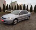 Сірий Міцубісі Lancer, об'ємом двигуна 0.16 л та пробігом 291 тис. км за 3900 $, фото 1 на Automoto.ua