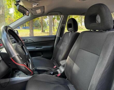 Серый Мицубиси Лансер, объемом двигателя 1.6 л и пробегом 196 тыс. км за 4390 $, фото 16 на Automoto.ua