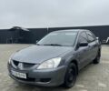 Сірий Міцубісі Lancer, об'ємом двигуна 1.6 л та пробігом 231 тис. км за 3500 $, фото 2 на Automoto.ua