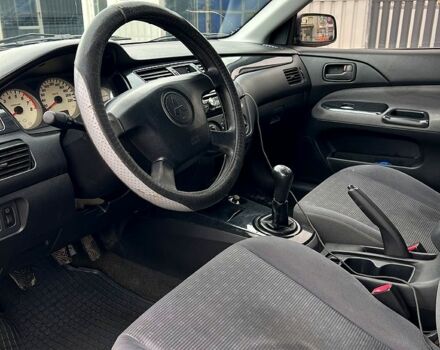 Сірий Міцубісі Lancer, об'ємом двигуна 1.6 л та пробігом 236 тис. км за 3800 $, фото 7 на Automoto.ua