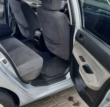 Серый Мицубиси Лансер, объемом двигателя 1.6 л и пробегом 277 тыс. км за 3500 $, фото 3 на Automoto.ua