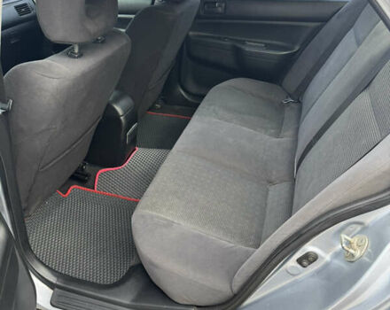 Серый Мицубиси Лансер, объемом двигателя 1.58 л и пробегом 260 тыс. км за 3500 $, фото 7 на Automoto.ua