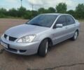 Сірий Міцубісі Lancer, об'ємом двигуна 1.6 л та пробігом 250 тис. км за 4000 $, фото 6 на Automoto.ua