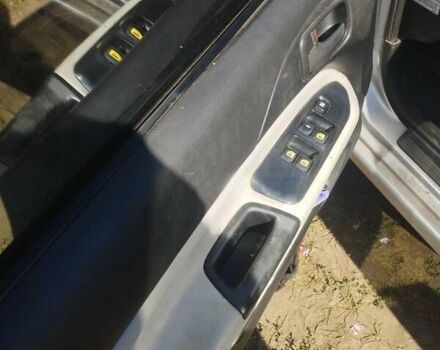 Сірий Міцубісі Lancer, об'ємом двигуна 1.6 л та пробігом 244 тис. км за 3300 $, фото 8 на Automoto.ua