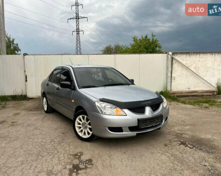 Сірий Міцубісі Lancer, об'ємом двигуна 1.6 л та пробігом 310 тис. км за 3350 $, фото 8 на Automoto.ua