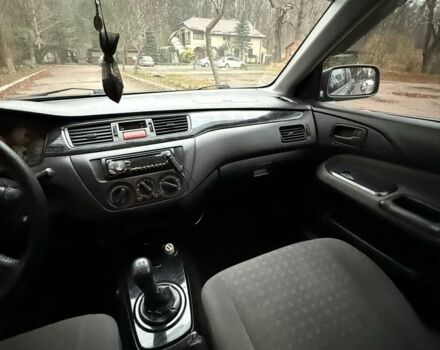 Сірий Міцубісі Lancer, об'ємом двигуна 1.6 л та пробігом 230 тис. км за 2799 $, фото 22 на Automoto.ua