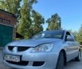 Сірий Міцубісі Lancer, об'ємом двигуна 1.6 л та пробігом 154 тис. км за 4700 $, фото 1 на Automoto.ua