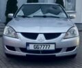 Сірий Міцубісі Lancer, об'ємом двигуна 2 л та пробігом 187 тис. км за 4497 $, фото 5 на Automoto.ua