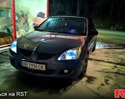 Сірий Міцубісі Lancer, об'ємом двигуна 1.6 л та пробігом 290 тис. км за 4200 $, фото 4 на Automoto.ua