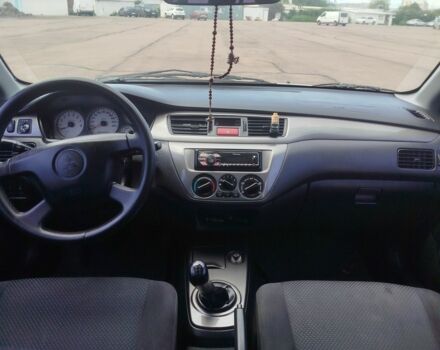 Серый Мицубиси Лансер, объемом двигателя 1.6 л и пробегом 250 тыс. км за 3600 $, фото 21 на Automoto.ua