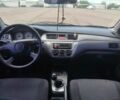 Серый Мицубиси Лансер, объемом двигателя 1.6 л и пробегом 250 тыс. км за 3600 $, фото 21 на Automoto.ua