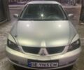 Сірий Міцубісі Lancer, об'ємом двигуна 1.6 л та пробігом 316 тис. км за 3500 $, фото 1 на Automoto.ua