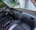 Сірий Міцубісі Lancer, об'ємом двигуна 2 л та пробігом 360 тис. км за 3400 $, фото 27 на Automoto.ua
