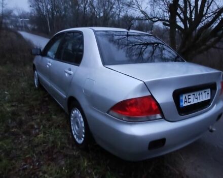 Серый Мицубиси Лансер, объемом двигателя 1.6 л и пробегом 235 тыс. км за 2850 $, фото 9 на Automoto.ua