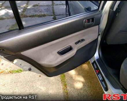 Серый Мицубиси Лансер, объемом двигателя 1.6 л и пробегом 189 тыс. км за 3950 $, фото 6 на Automoto.ua