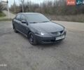Серый Мицубиси Лансер, объемом двигателя 1.6 л и пробегом 305 тыс. км за 4000 $, фото 1 на Automoto.ua