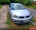 Сірий Міцубісі Lancer, об'ємом двигуна 1.6 л та пробігом 250 тис. км за 2900 $, фото 1 на Automoto.ua