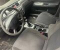 Сірий Міцубісі Lancer, об'ємом двигуна 1.58 л та пробігом 315 тис. км за 2350 $, фото 3 на Automoto.ua