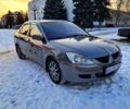 Серый Мицубиси Лансер, объемом двигателя 1.6 л и пробегом 289 тыс. км за 3400 $, фото 1 на Automoto.ua