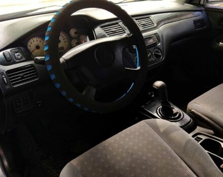 Серый Мицубиси Лансер, объемом двигателя 1.6 л и пробегом 189 тыс. км за 3950 $, фото 3 на Automoto.ua