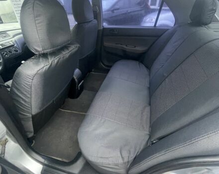 Серый Мицубиси Лансер, объемом двигателя 1.6 л и пробегом 200 тыс. км за 3906 $, фото 9 на Automoto.ua