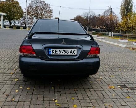 Серый Мицубиси Лансер, объемом двигателя 1.6 л и пробегом 100 тыс. км за 3500 $, фото 3 на Automoto.ua