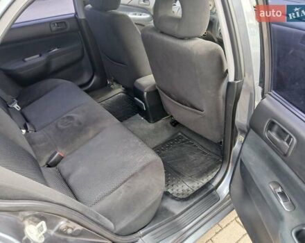 Сірий Міцубісі Lancer, об'ємом двигуна 1.58 л та пробігом 200 тис. км за 4000 $, фото 2 на Automoto.ua