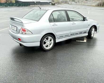 Сірий Міцубісі Lancer, об'ємом двигуна 2 л та пробігом 1 тис. км за 3500 $, фото 5 на Automoto.ua