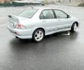 Сірий Міцубісі Lancer, об'ємом двигуна 2 л та пробігом 1 тис. км за 3500 $, фото 5 на Automoto.ua