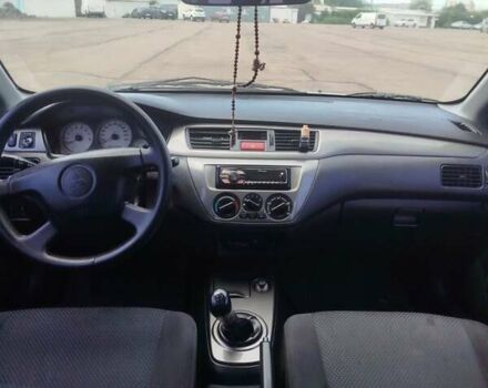 Сірий Міцубісі Lancer, об'ємом двигуна 1.6 л та пробігом 250 тис. км за 4000 $, фото 12 на Automoto.ua