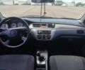 Серый Мицубиси Лансер, объемом двигателя 1.6 л и пробегом 250 тыс. км за 4000 $, фото 12 на Automoto.ua