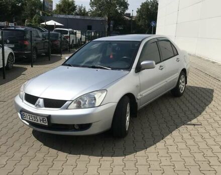 Сірий Міцубісі Lancer, об'ємом двигуна 1.58 л та пробігом 274 тис. км за 4400 $, фото 4 на Automoto.ua
