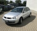 Сірий Міцубісі Lancer, об'ємом двигуна 1.58 л та пробігом 274 тис. км за 4400 $, фото 4 на Automoto.ua