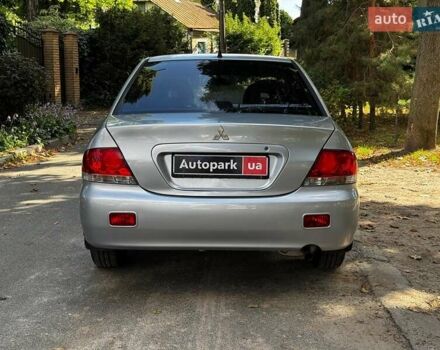 Серый Мицубиси Лансер, объемом двигателя 1.6 л и пробегом 196 тыс. км за 4490 $, фото 7 на Automoto.ua