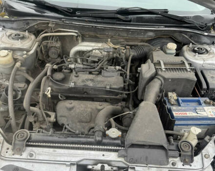 Серый Мицубиси Лансер, объемом двигателя 1.58 л и пробегом 260 тыс. км за 3500 $, фото 13 на Automoto.ua