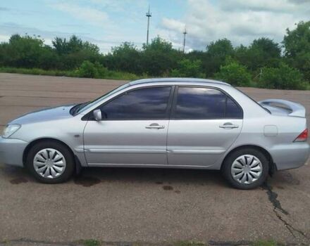 Сірий Міцубісі Lancer, об'ємом двигуна 1.6 л та пробігом 250 тис. км за 4000 $, фото 1 на Automoto.ua