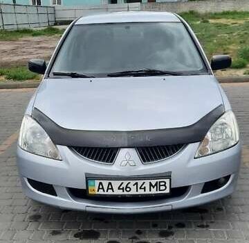 Серый Мицубиси Лансер, объемом двигателя 1.6 л и пробегом 277 тыс. км за 3500 $, фото 7 на Automoto.ua