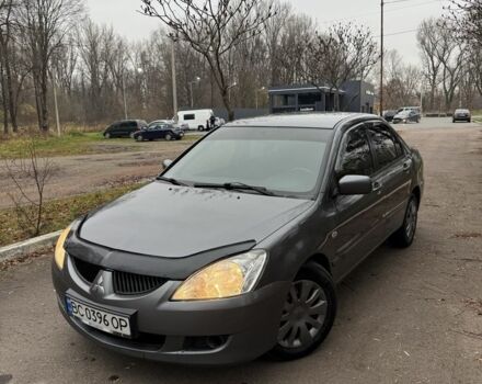 Сірий Міцубісі Lancer, об'ємом двигуна 1.6 л та пробігом 230 тис. км за 2799 $, фото 5 на Automoto.ua